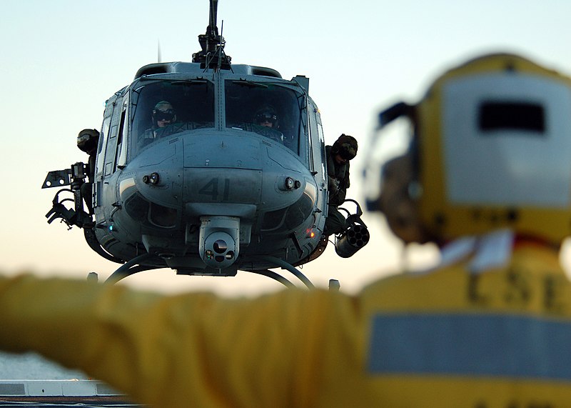 File:US Navy 071115-N-5436T-097 Aviation Support Equipment Technician 2nd Class James Barron signals a UH-1N Huey to land aboard the amphibious transport dock USS New Orleans (LPD 18).jpg