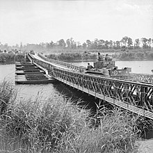 Cromwell tanks moving across York Bridge, a Bailey bridge built over the Caen Canal and the Orne River. York bridge.jpg