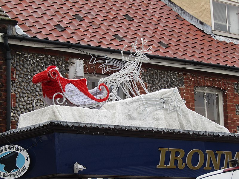 File:-2019-11-26 Santa’s sleigh, Blythe & Wright, Station Road, Sheringham.JPG