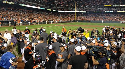 members of the 2014 Baltimore Orioles celebrating at Oriole Park immediately after clinching the American League East title