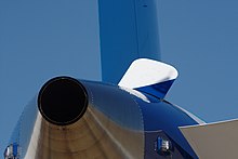 The APU exhaust on a Boeing 787 tail, with intake panel open 787 - Flickr - Beige Alert (4).jpg