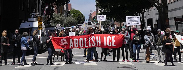 Protesters in San Francisco with a DSA banner calling for the abolition of ICE