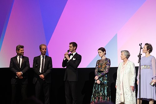 The cast of Breathe at the premiere for the film; In order from left to right Andy Serkis, Jonathan Cavendish, Andrew Garfield, Claire Foy and Diana Cavendish