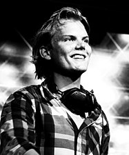 Avicii placed two number ones on this chart in 2019, "SOS" in June and "Heaven" in July, the first time an artist that has done so posthumously Avicii @ London tentparty (cropped).jpg