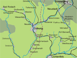 Railway lines to Coburg. Key:
Solid black: railways in use
Dotted black:closed railways
Dashed purple: high-speed line under construction Bahnstrecken-Coburger-Land.png