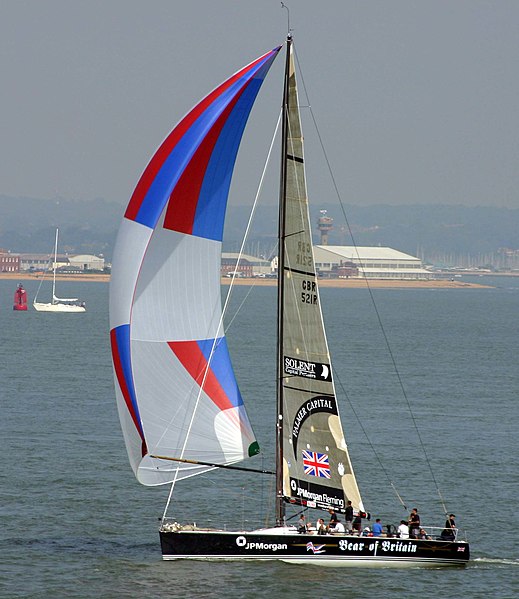 Bear of Britain, a Farr 52 with masthead spinnaker in front of Calshot Spit