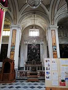 Madonna del Carmelo raffigurata tra le mistiche Santa Maria Maddalena de' Pazzi e Santa Teresa d'Avila, chiesa del Carmine Maggiore.