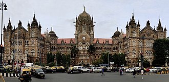 Chhatrapati Shivaji Terminus in Mumbai, India. A mixture of Romanesque, Gothic and Indian elements. CSTM Mumbai Panoramic view by Dr. Raju Kasambe 20190712 (4) (cropped and fixed angles).jpg