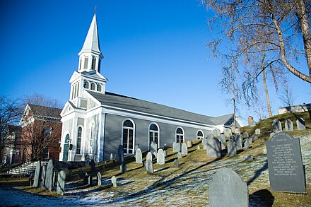 Holy Family Church, and the Old Hill Burying Ground, on Monument Square in Concord