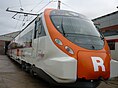 Civia пойызының алдыңғы жағы. Алдыңғы жағында үлкен 'R' (Rodalies de Catalunya) тұр.