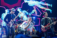 Coldplay at the 2017 Global Citizen Festival. The band's visuals for A Head Full of Dreams (2015) reflected the album's bright, uplifting tones. Coldplay - Global-Citizen-Festival Hamburg 14.jpg