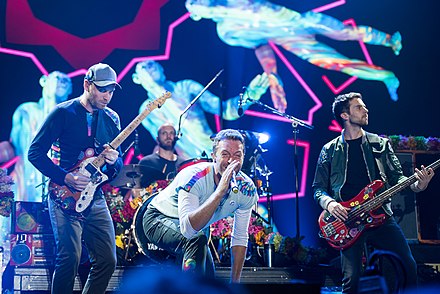 Coldplay, the most commercially successful post-Britpop band, on stage in 2017.[57] Their first three albums – Parachutes (2000), A Rush of Blood to the Head (2002) and X&Y (2005) – are among the best-selling albums in UK chart history.[58]
