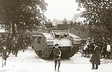 Estonian Mark V driving along Tallinn. EST-Tanks-Mark V-Driving along Tallinn (1920).jpg