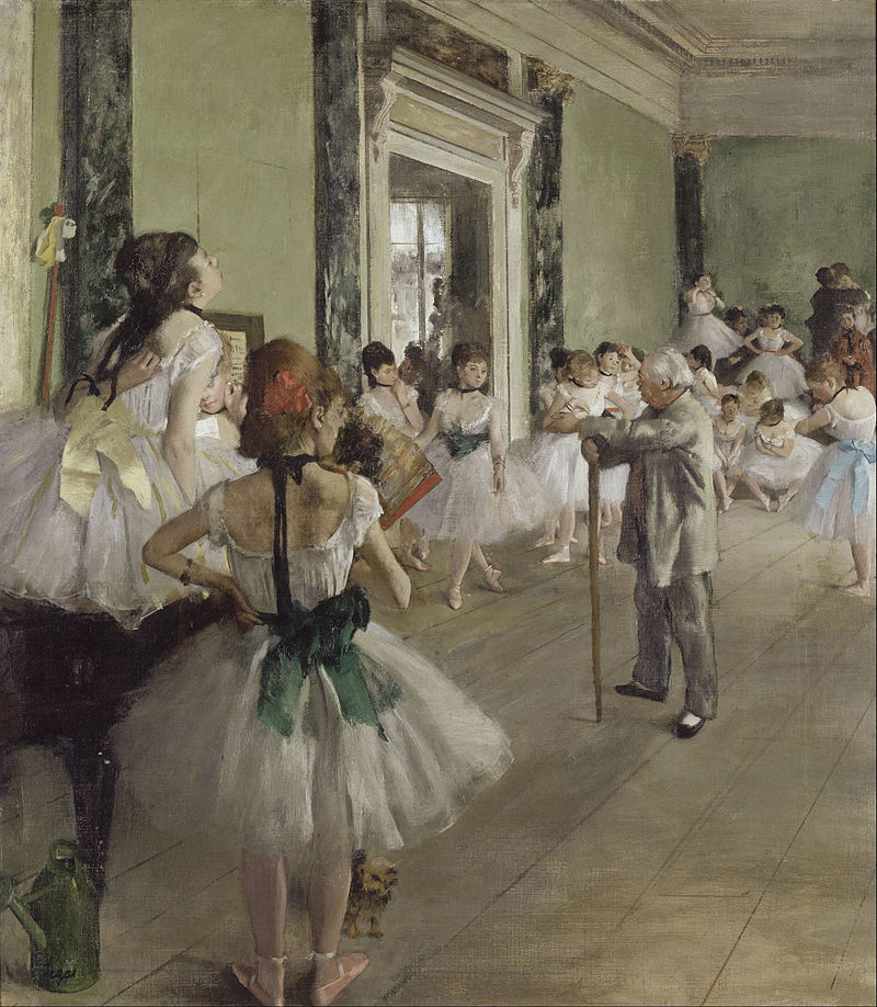 A class of ballet dancers with an older teacher