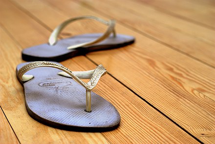 Flip-flops or shower shoes are essential for using a hostel shower.