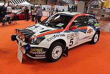Colin McRae & Nicky Grist's 2002 Ford Focus RS WRC at the Autosport Show, January 2013 Ford Focus WRC 2002 Colin McRae & Nicky Grist Autosport Show January 2013.jpg