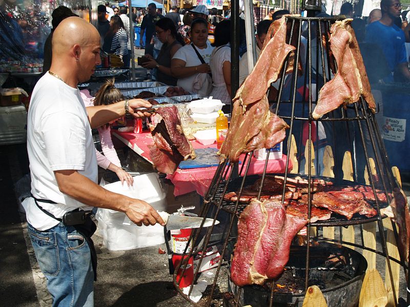 File:Hanging Meat at a Street Fair 2.JPG