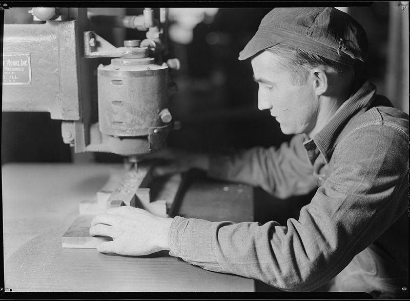 File:High Point, North Carolina - Upholstering. Tomlinson Chair Manufacturing Co. Air rodder - chair leg - showing machine... - NARA - 518497.jpg