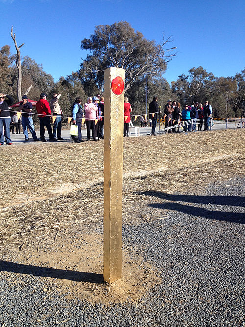 A "Golden Guidepost" on the Holbrook Bypass section of Hume Freeway. The guidepost symbolises the connection of Melbourne and Sydney by dual carriagew