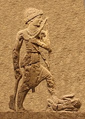 Iddin-Sin, King of the Simurrum. The Simurrum, a mountain tribe, were vanquished by the armies of the Third Dynasty of Ur, c. 2000 BC (detail) Iddin-Sin, King of Simurrum, c. 2000 BC (detail).jpg