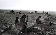 Israeli paratroopers dig in near the Parker Memorial Israeli troops in sinai war.jpg