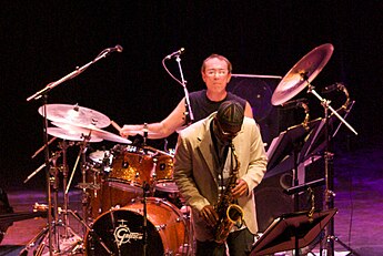 Colaiuta with Kenny Garrett in the Five Peace Band, 2008 Kenny Garrett & Vinnie Colaiuta.jpg