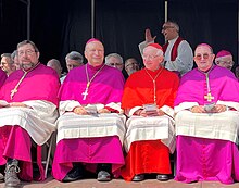 Bishop Jean-Pierre Delville, nuncio Franco Coppola, Cardinal Jozef De Kesel, Bishop Guy Harpigny Koorkledij (vlnr Jean-Pierre Delville-Franco Coppola-Jozef De Kesel - Guy Harpigny).jpg