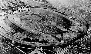 Los Angeles Memorial Coliseum, home of the Los Angeles Rams, was constructed at the expense of the city's taxpayers in 1922. It was also the venue used by the highly successful collegiate football programs of Los Angeles universities USC and UCLA. LAColiseum-under-construction-1922.jpg