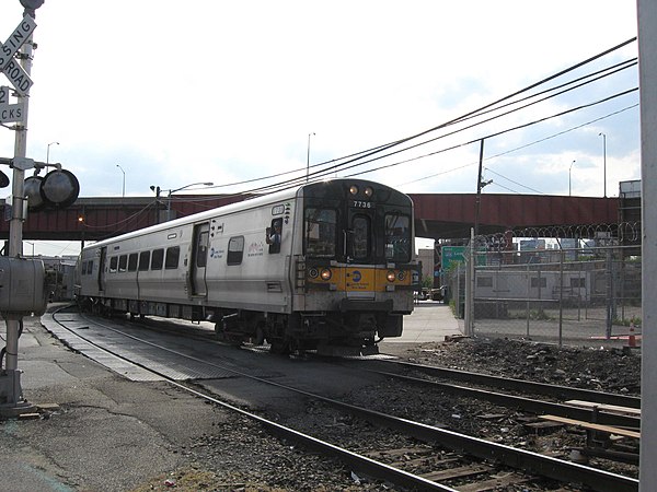 Westbound view of the line at the Borden Avenue grade crossing, looking west towards Long Island City.