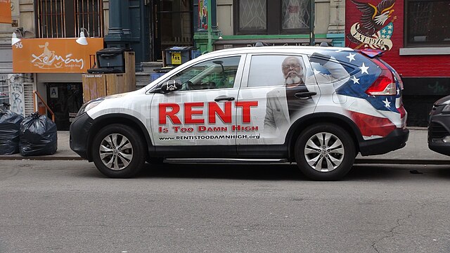 Rent Is Too Damn High Party car parked on St Marks Place