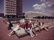People sitting at the original fountain in 1973 MIDSUMMER SIESTA AT CITY HALL PLAZA - NARA - 550751 color corrected.jpg