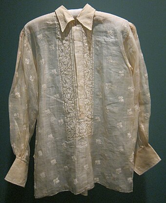 Late 19th century barong tagalog made from piña with both pechera ("shirt front") and sabog ("scattered") embroidery, from the Honolulu Museum of Art