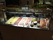 Meats and cheeses in the breakfast buffet (30735162988).jpg