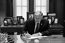 Parson signing a bill in 2019 Mike Parson signing a bill B&W.jpg