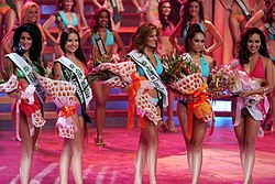 Miss Earth 2007 Award winners: Lebanon (Friendship), Lithuania (Talent), Venezuela (Swimsuit & Long Gown), Thailand (National Costume), and the Philippines (Photogenic) Missearth07specialawards.jpg