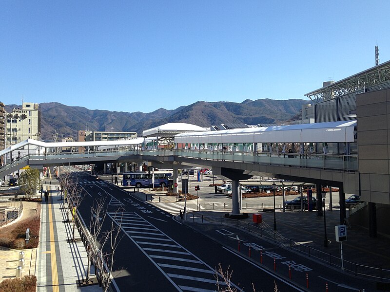 File:Okuchichibu Mountains from northern footbridge of Kofu Station.jpg