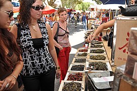 A stand selling olives