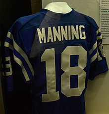 Manning's #18 jersey exhibited at the Pro Football Hall of Fame. Manning himself was inducted in 2021. Peyton Manning (11282729044).jpg