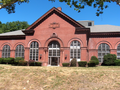 Philadelphia Water Department Belmont Pumping Station, built 1900, East River Drive at Montgomery Drive, Philadelphia, PA. View from the river bank.