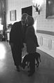 Photograph of President William Jefferson Clinton and First Lady Hillary Rodham Clinton with Buddy this Dog- 12-18-1997 (6461525859).jpg