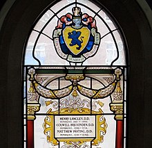 Photograph of stained glass with the name of Henry Langley engraved.jpg