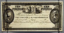 Proof banknote, 10 pounds, Knaresborough Old Bank, 1800s. Details, like the decorative frame and image of Knaresborough Castle as well as figures of Fortune and Plenty at left and right on this note, were intended to prevent forged notes from being made. On display at the British Museum in London Proof banknote, Knaresborough Old Bank, 1800s. On display at the British Museum in London.jpg