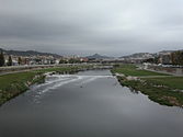 View o the river Besòs as it passes throu the municipality. In the later course o the river the "Riverside Pairk o Besòs" wis creatit an haes become a important public open space.