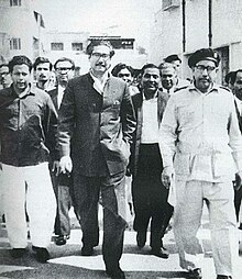 Sheikh Mujib being released from prison after a mass uprising in East Pakistan against the Agartala Conspiracy Case. Mujib often donned a South Asian prince suit. Release of Sheikh Mujib from Prison.jpg