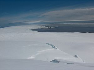 View from Miziya Peak to the Saedineni snowfield with the Teres Ridge (foreground) and Vasilev Bay and Melta Point (background)