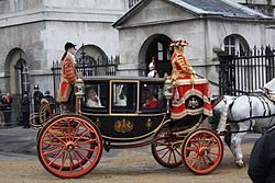 The Glass Coach returning the Ladies in Waiting to Buckingham Palace after the State Opening of Parliament, 2008. State Opening of Parliament 2008 VII (3082930784).jpg