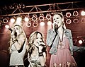 Stealing Angels singers Caroline Cutbirth (left) and Jennifer Kuhle (right) from The Amazing Race 22 and The Amazing Race 24: All-Stars (with former bandmate Tayla Lynn [center])