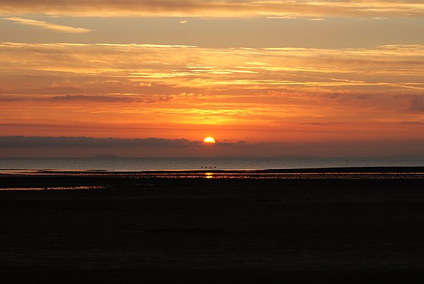 Sunrise viewed from Minehead, showing Steep Holm and Brean Down