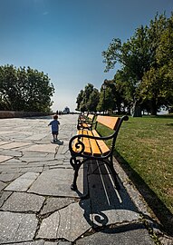 Toddler explores the Bratislava Castle grounds, near the statue of Alžbeta Durínska (Elizabeth of Hungary) (Bratislava, Slovakia)