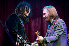 Mike Campbell (left) and Tom Petty at Bonnaroo in 2013 Tom Petty Bonnaroo 2013-06-16.jpg